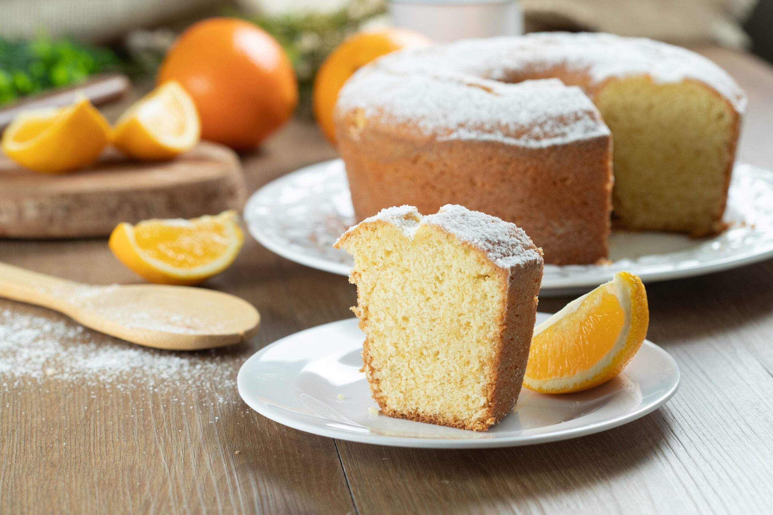 Close,Up,Piece,Of,Moist,Orange,Fruit,Cake,On,Plate