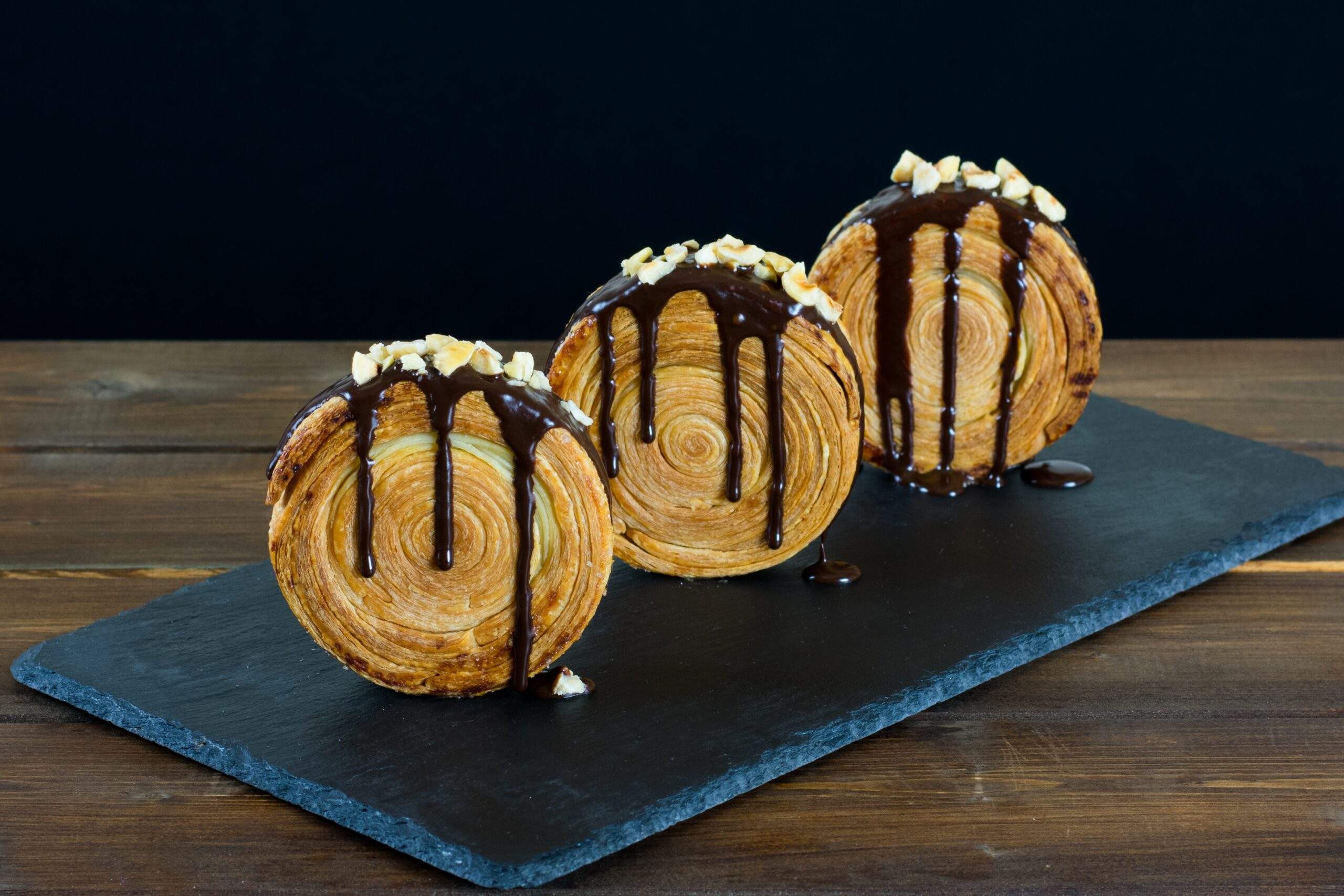 New,York,Roll,,Round,Croissant,Filled,And,Covered,With,Chocolate.
